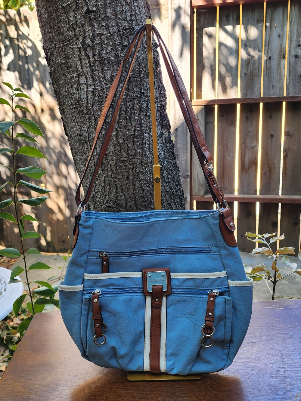 Rosetti Multi-Pocket Shoulder Bag Blue Faux Leather Brown Trim Hobo Purse